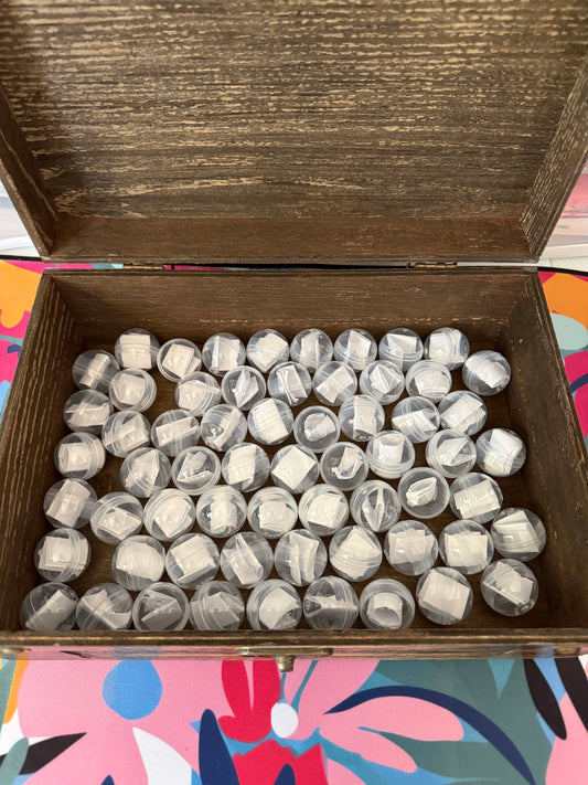 Mystery ball scoop